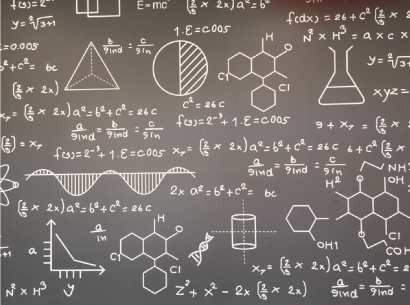 A chalkboard with equations and formulas written on it.